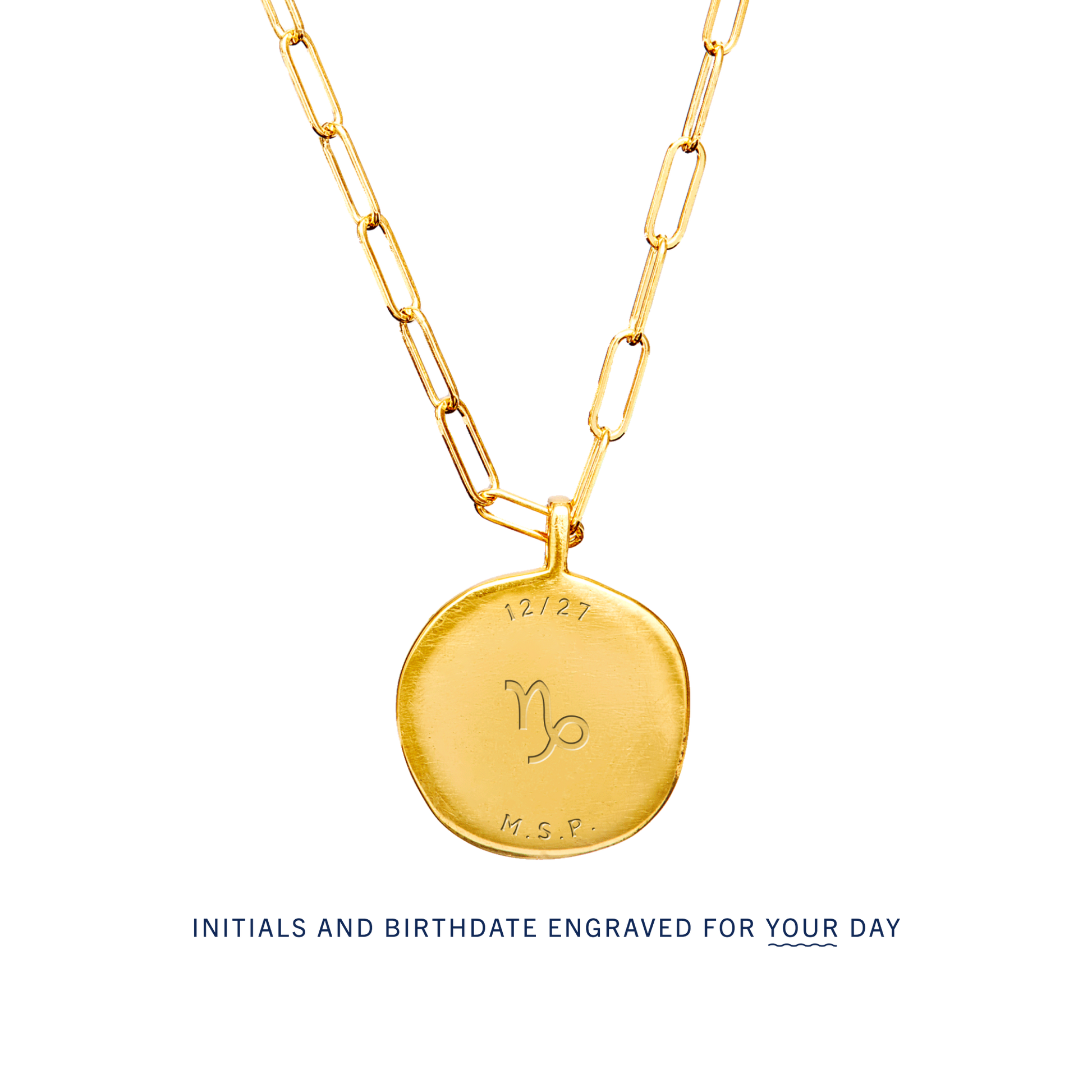 The back of a Birthdate Pendant with sample engraving. Initials and birthdate can be custom engraved for your day.